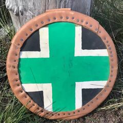 shield with green cross