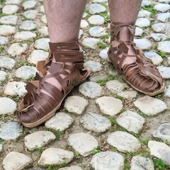 sandals on white cobblestones