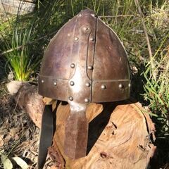 norman helmet on rock