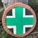 shield with green cross